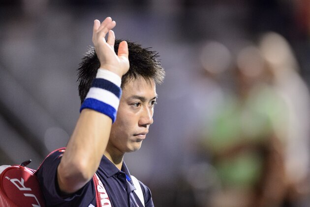 MONTREAL, ON - AUGUST 15:  Kei Nishikori of Japan walks off the court after his loss to Andy Murray of Great Britain during day six of the Rogers Cup at Uniprix Stadium on August 15, 2015 in Montreal, Quebec, Canada.  Andy Murray defeated Kei Nishikori 6-3, 6-0. (Photo by Minas Panagiotakis/Getty Images)