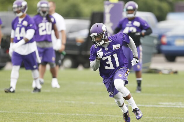 Minnesota Vikings running back Jerick McKinnon runs a route during the NFL team's practice, Thursday, June 4, 2015, in Eden Prairie, Minn. (AP Photo/Jim Mone)