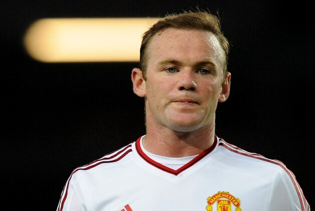 Manchester United’s Wayne Rooney during the English Premier League soccer match between Aston Villa and Manchester United at Villa Park, Birmingham, England, Friday, Aug. 14, 2015. (AP Photo/Rui Vieira)