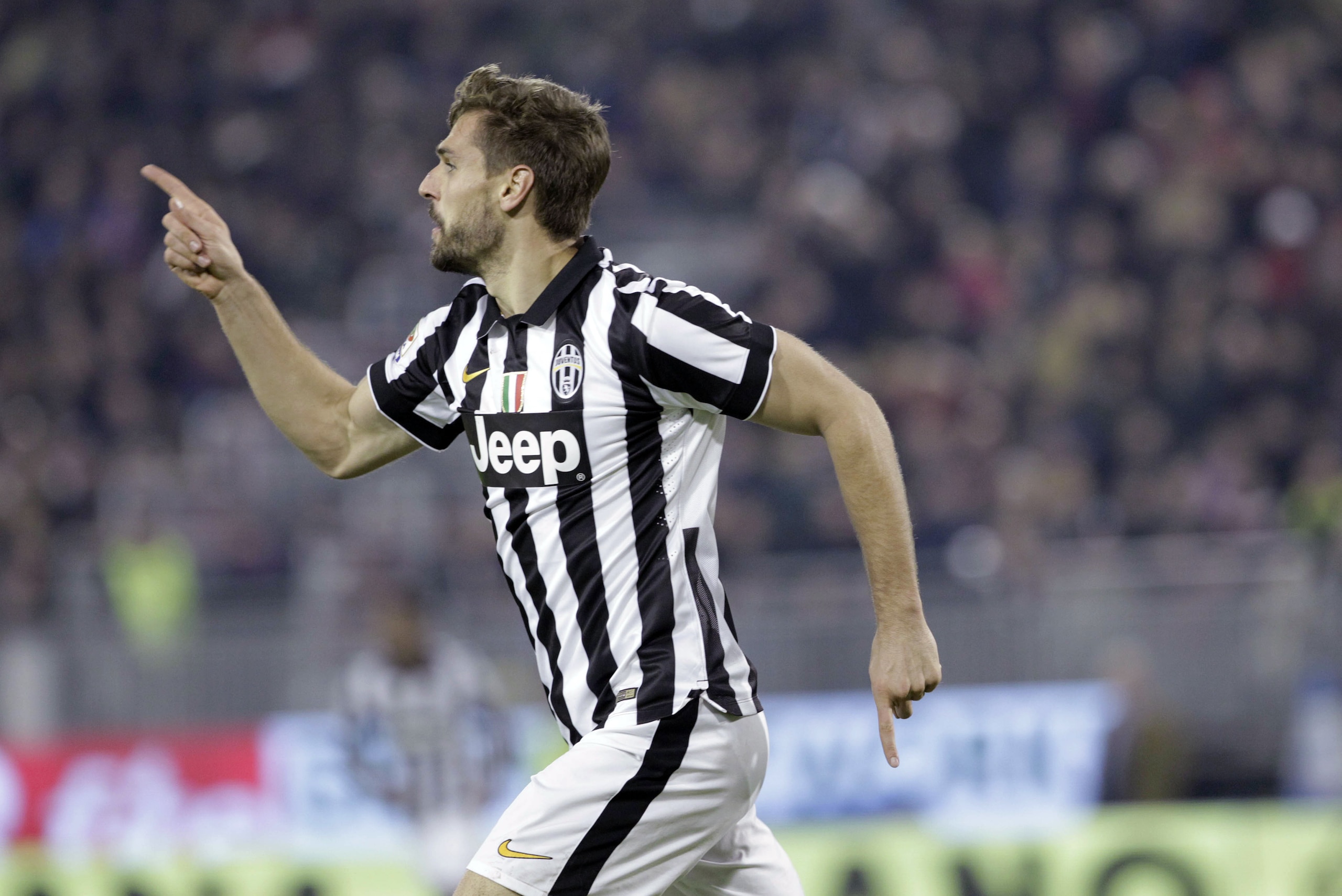 Juventus' Fernando Llorente celebrates after scoring during an Italian Serie A soccer match between Cagliari and Juventus, at the Sant' Elia stadium in Cagliari, Italy, Thursday, Dec. 18, 2014. (AP Photo/Daniela Santoni)