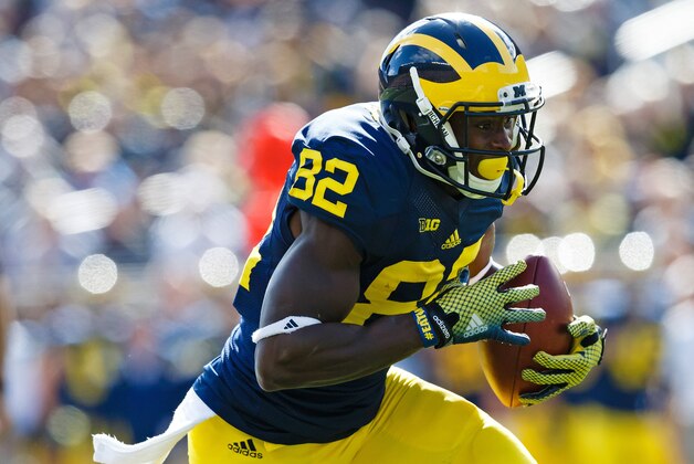 Sep 13, 2014; Ann Arbor, MI, USA; Michigan Wolverines wide receiver Amara Darboh (82) rushes in the first half against the Miami (Oh) Redhawks at Michigan Stadium. Mandatory Credit: Rick Osentoski-USA TODAY Sports