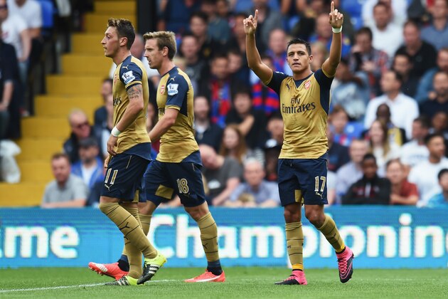 LONDON, ENGLAND - AUGUST 16: Alexis Sanchez of Arsenal celebrates the own goal scored by Damien Delaney of Crystal Palace during the Barclays Premier League match between Crystal Palace and Arsenal at Selhurst Park on August 16, 2015 in London, England.  (Photo by Michael Regan/Getty Images)