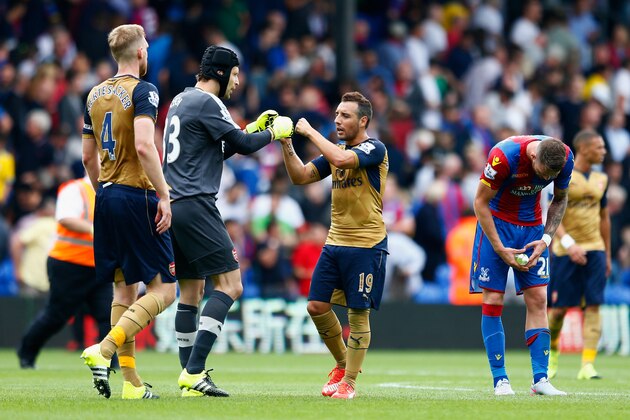 LONDON, ENGLAND - AUGUST 16: Santi Cazorla of Arsenal celebrates victory with Petr Cech of Arsenal after the Barclays Premier League match between Crystal Palace and Arsenal at Selhurst Park on August 16, 2015 in London, England.  (Photo by Julian Finney/Getty Images)