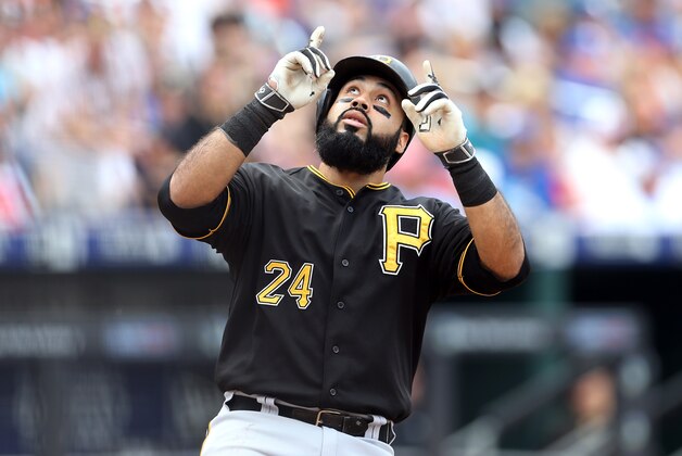 Aug 16, 2015; New York City, NY, USA; Pittsburgh Pirates first baseman Pedro Alvarez (24) celebrates after hitting a solo home run against the New York Mets during the second inning at Citi Field. Mandatory Credit: Adam Hunger-USA TODAY Sports