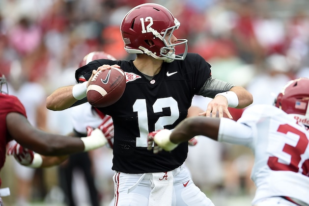 TUSCALOOSA, AL - APRIL 18:  David Cornwell #12 of the Crimson team drops back to pass against the White team during the University of Alabama A Day spring game at Bryant-Denny Stadium on April 18, 2015 in Tuscaloosa, Alabama.  (Photo by Stacy Revere/Getty Images)