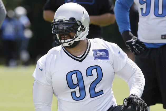 Detroit Lions defensive tackle Haloti Ngata prepares to run through a drill during NFL football minicamp, Tuesday, June 16, 2015, in Allen Park, Mich. (AP Photo/Carlos Osorio)
