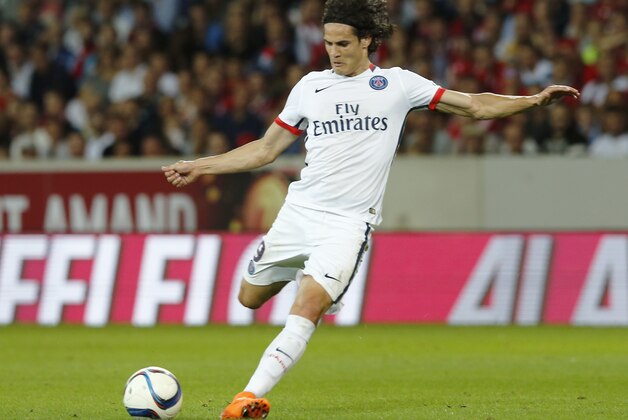 Paris Saint Germain's  Edinson Cavani control the ball during his French League one soccer match against Lille at the Lille Metropole stadium, in Villeneuve d'Ascq, northern France, Friday, Aug. 7, 2015.(AP Photo/Jacques Brinon)