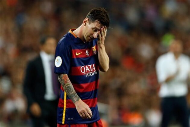 Barcelona's Lionel Messi reacts after losing the ball to Athletic Bilbao's Mikel Balenziaga during a second leg Spanish Super Cup soccer match between FC Barcelona and Athletic Bilbao at the Camp Nou stadium in Barcelona, Spain, Monday, Aug.17, 2015. (AP Photo/Manu Fernandez)