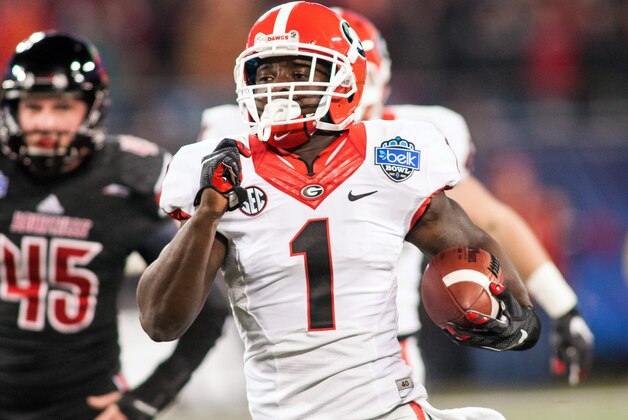 Dec 30, 2014; Charlotte, NC, USA; Georgia Bulldogs running back Sony Michel (1) returns a kick during the first quarter against the Louisville Cardinals in the Belk Bowl held at Bank of America Stadium. Mandatory Credit: Jeremy Brevard-USA TODAY Sports