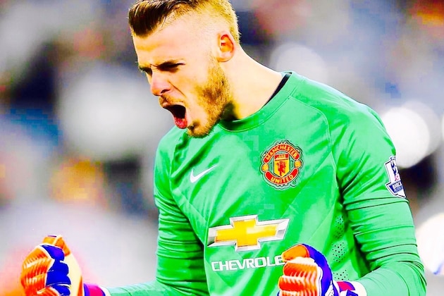 Manchester United’s goalkeeper David De Gea looks up at the end of  the English FA Cup quarterfinal soccer match between Manchester United and Arsenal at Old Trafford Stadium, Manchester, England, Monday, March 9, 2015. Arsenal won the game 2-1.(AP Photo/Jon Super)