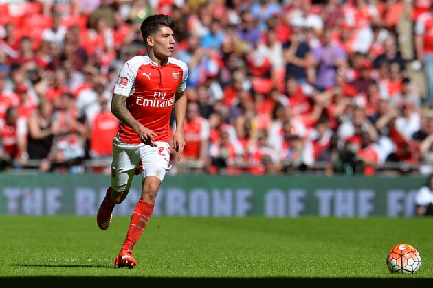 Arsenal's Spanish defender Hector Bellerin runs with the ball during the FA Community Shield football match between Arsenal and Chelsea at Wembley Stadium in north London on August 2, 2015. Arsenal won the game 1-0. AFP PHOTO / GLYN KIRK

 -- NOT FOR MARKETING OR ADVERTISING USE / RESTRICTED TO EDITORIAL USE --        (Photo credit should read GLYN KIRK/AFP/Getty Images)