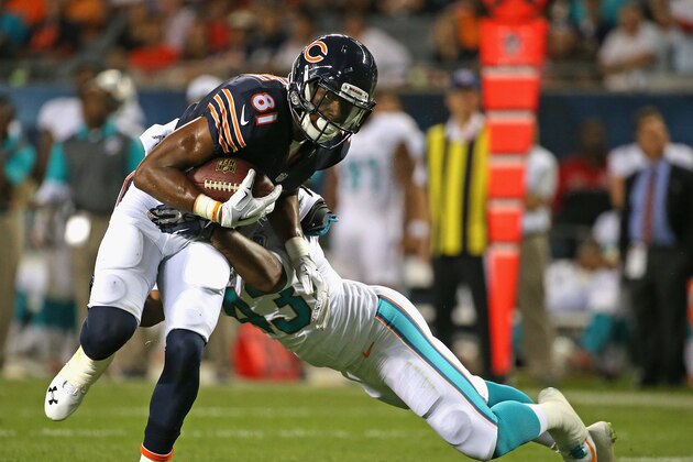 CHICAGO, IL - AUGUST 13: Cameron Meredith #81 of the Chicago Bears breaks away from Phillip Thomas #43 of the Miami Dolphins during a preseason game at Soldier Field on August 13, 2015 in Chicago, Illinois. The Bears defeated the Dolphins 27-10.  (Photo by Jonathan Daniel/Getty Images)