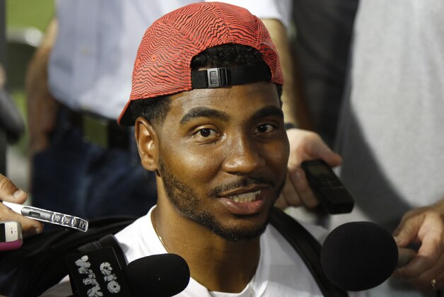 Former Ohio State quarterback turned wide receiver Braxton Miller speaks to reporters during the university's NCAA college football media day in Columbus, Ohio, Sunday, Aug. 16, 2015. (AP Photo/Paul Vernon)