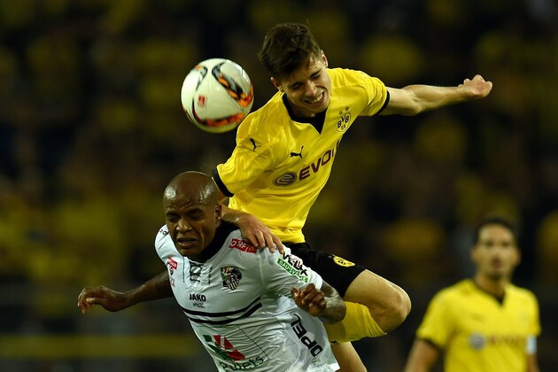 Dortmund's defender Julian Weigl and Wolfberg´s Brazilian forward Silvio (L) vie for the ball during the UEFA Europa League third qualifying round second leg football match between  Borussia Dortmund and Wolfsberger AC on August 6, 2015 in Dortmund, western Germany. AFP PHOTO / PATRIK STOLLARZ        (Photo credit should read PATRIK STOLLARZ/AFP/Getty Images)