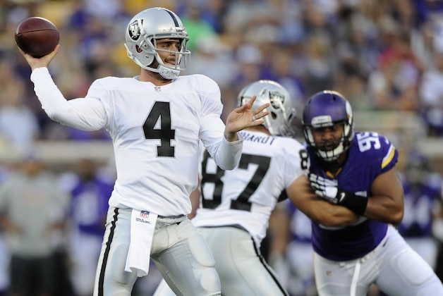 MINNEAPOLIS, MN - AUGUST 8: Derek Carr #4 of the Oakland Raiders passes the ball during the second quarter of the game against the Minnesota Vikings on August 8, 2014 at TCF Bank Stadium in Minneapolis, Minnesota. (Photo by Hannah Foslien/Getty Images)