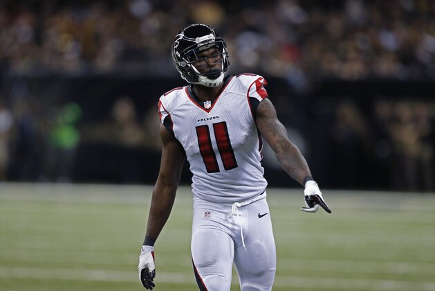 Atlanta Falcons wide receiver Julio Jones (11) reacts in the second half of an NFL football game against the New Orleans Saints in New Orleans, Sunday, Dec. 21, 2014. (AP Photo/Rogelio Solis)