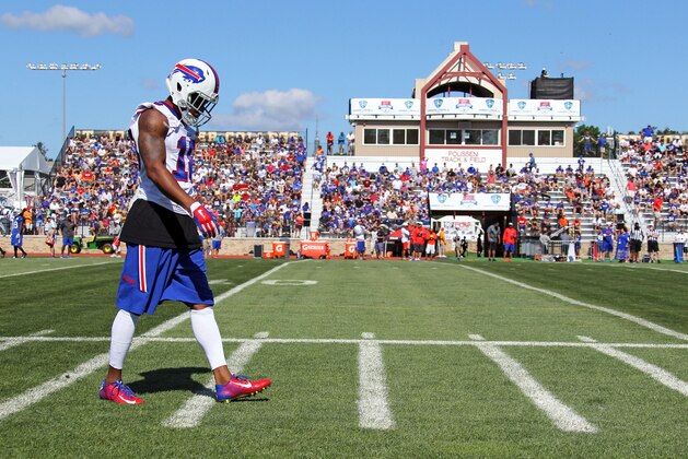 Buffalo Bills wide receiver Percy Harvin (18) walks the sidelines during an NFL football training camp in Pittsford, N.Y., Saturday, Aug. 1, 2015. (AP Photo/Bill Wippert)