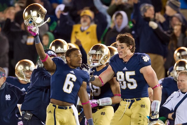 Oct 19, 2013; South Bend, IN, USA; Notre Dame Fighting Irish cornerback KeiVarae Russell (6) and tight end Troy Niklas (85) celebrate in the fourth quarter against the USC Trojans at Notre Dame Stadium. Notre Dame won 14-10. Mandatory Credit: Matt Cashore-USA TODAY Sports