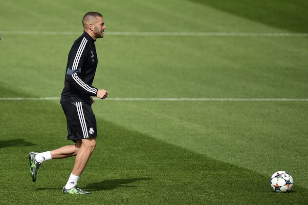 Real Madrid's French forward Karim Benzema trains at Valdebebas Sport City in Madrid on April 13, 2015 on the eve of their UEFA Champions League quarter final first leg football match against Atletico de Madrid. AFP PHOTO/ PIERRE-PHILIPPE MARCOU        (Photo credit should read PIERRE-PHILIPPE MARCOU/AFP/Getty Images)