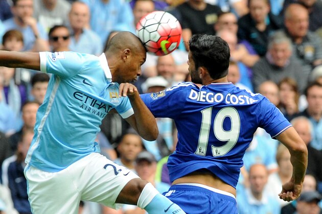 Manchester City’s Fernandinho, left, contests the ball with Chelsea’s Diego Costa during the English Premier League soccer match between Manchester City and Chelsea at Etihad stadium, Manchester, England, Sunday, Aug. 16, 2015. (AP Photo/Rui Vieira)