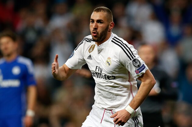 MADRID, SPAIN - MARCH 10:  Karim Benzema of Real Madrid celebrates after scoring his team's third goal during the UEFA Champions League Round of 16 second leg match between Real Madrid CF and FC Schalke 04 at Estadio Santiago Bernabeu on March 10, 2015 in Madrid, Spain.  (Photo by Boris Streubel/Getty Images)