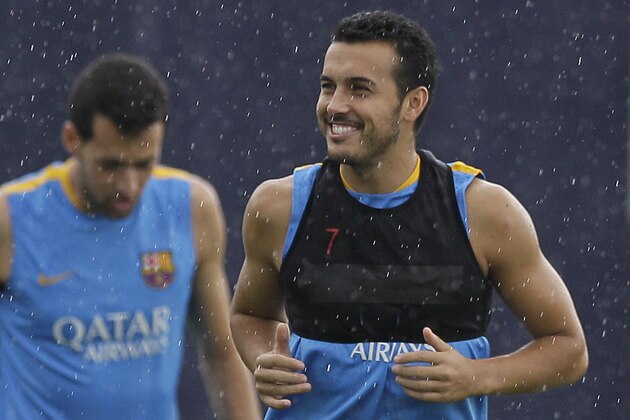 FC Barcelona's Pedro Rodriguez attends a training session one day ahead a Spanish Supercup first leg soccer match against Athletic Bilbao at the Sports Center FC Barcelona Joan Gamper in San Joan Despi, Spain, Thursday, Aug. 13, 2015. (AP Photo/Manu Fernandez)