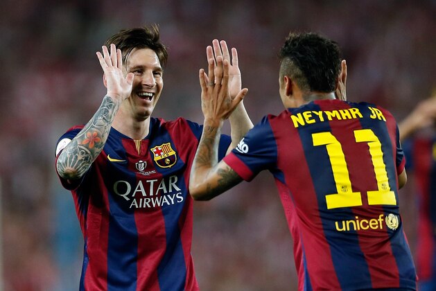 FILE - In this May 30, 2015 file photo, Barcelona's Neymar celebrates with Lionel Messi after scoring his side’s second goal during the final of the Copa del Rey soccer match between FC Barcelona and Athletic Bilbao at the Camp Nou stadium in Barcelona, Spain. (AP Photo/Manu Fernandez, File)