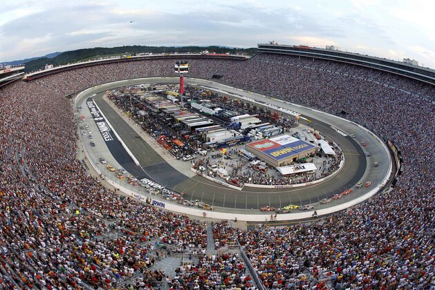 Drivers circle the track during the NASCAR auto racing Irwin Tools Night Race on Saturday, Aug. 21, 2010 in Bristol, Tenn. (AP Photo/Mark Humphrey)