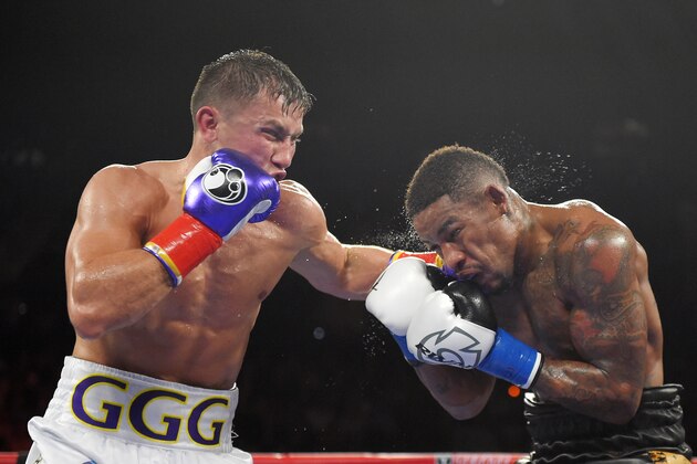 Gennady Golovkin, left, of Kazakhstan, connects with Willie Monroe Jr. during a middleweight world championship bout, Saturday, May 16, 2015, in Inglewood, Calif. Golovkin won in the sixth round. (AP Photo/Mark J. Terrill)