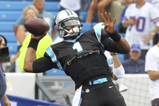 Carolina Panthers quarterback Cam Newton (1) warms up before an NFL preseason football game against the Buffalo Bills  on Friday, Aug. 14, 2015, in Orchard Park, N.Y. (AP Photo/Bill Wippert)