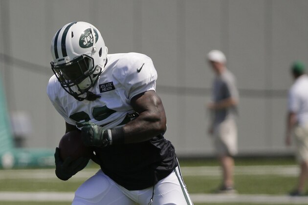 New York Jets running back Zac Stacy (38) runs the ball during a drill at the team's NFL football training camp, Saturday, Aug. 1, 2015, in Florham Park, N.J.. (AP Photo/Julie Jacobson)