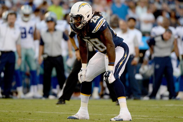 SAN DIEGO - AUGUST 13: Runningback Melvin Gordon #28 of San Diego Chargers in the backfield against the Dallas Cowboys during the first half of their NFL Preseason game at Qualcomm Stadium on August 13, 2015 in San Diego, California. (Photo by Donald Miralle/Getty Images) SAN DIEGO - AUGUST 13: Runningback Melvin Gordon #28 of San Diego Chargers in the backfield against the Dallas Cowboys during the first half of their NFL Preseason game at Qualcomm Stadium on August 13, 2015 in San Diego, California. (Photo by Donald Miralle/Getty Images)
