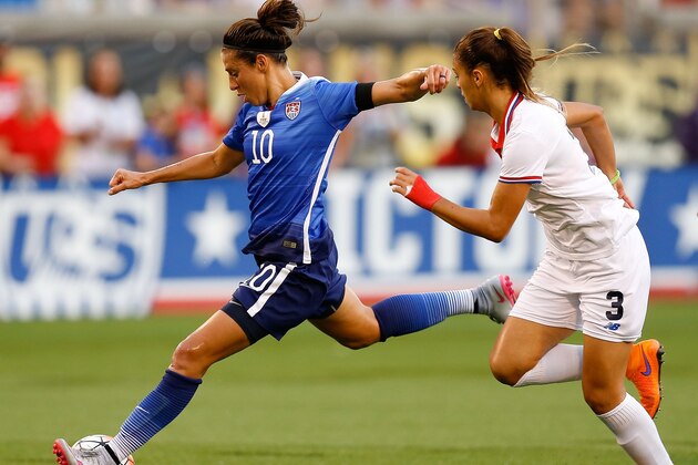 CHATTANOOGA, TN - AUGUST 19:  Midfielder Carli Lloyd #10 of the United States shoots in front of forward Fabiola Villalobos #3 of Costa Rica during the friendly match at Finley Stadium on August 19, 2015 in Chattanooga, Tennessee.  (Photo by Mike Zarrilli/Getty Images)