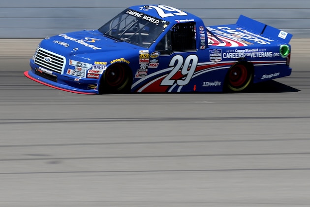 BROOKLYN, MI - AUGUST 15:  Ryan Blaney, driver of the #29 Cooper Standard Careers for Vets Ford, races during the NASCAR Camping World Truck Series Careers for Veterans 200 at Michigan International Speedway on August 15, 2015 in Brooklyn, Michigan.  (Photo by Jerry Markland/Getty Images)