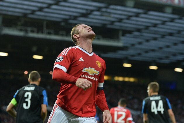 Manchester United's English striker Wayne Rooney gestures after a missed goal opportunity during the UEFA Champions League play off football match between Manchester United and Club Brugge at Old Trafford in Manchester, north west England, on August 18, 2015. AFP PHOTO / OLI SCARFF        (Photo credit should read OLI SCARFF/AFP/Getty Images)