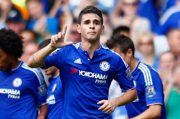 LONDON, ENGLAND - AUGUST 08:  Oscar of Chelsea celebrates scoring his team's first goal uring the Barclays Premier League match between Chelsea and Swansea City at Stamford Bridge on August 8, 2015 in London, England.  (Photo by Julian Finney/Getty Images)