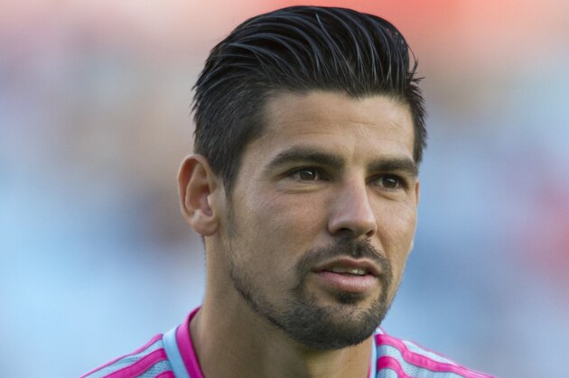 Celta's forward Nolito stands during the official team presentation at the Balaidos Stadium in Vigo on August 16, 2014. AFP PHOTO/ MIGUEL RIOPA        (Photo credit should read MIGUEL RIOPA/AFP/Getty Images)