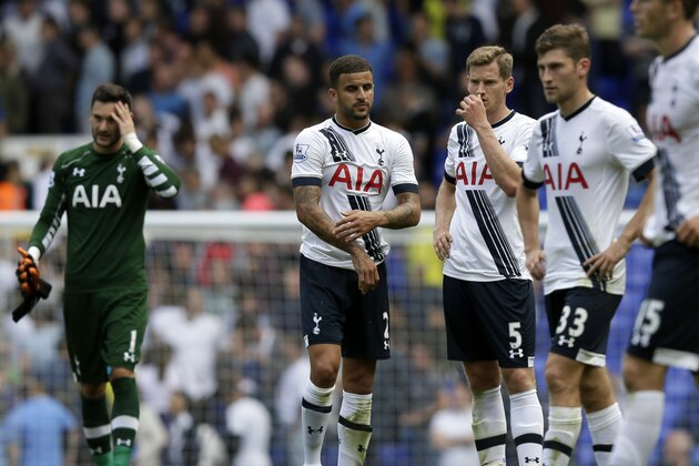 Tottenham players look dejected following the English Premier League soccer match between Tottenham Hotspur and Stoke City at White Hart Lane, London, Saturday, Aug. 15, 2015. (AP Photo/Tim Ireland)