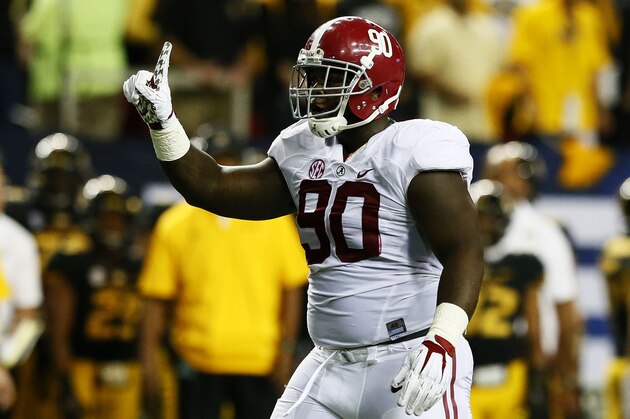 ATLANTA, GA - DECEMBER 06:  Jarran Reed #90 of the Alabama Crimson Tide celebrates a stop against the Missouri Tigers in the first quarter of the SEC Championship game at the Georgia Dome on December 6, 2014 in Atlanta, Georgia.  (Photo by Kevin C. Cox/Getty Images)