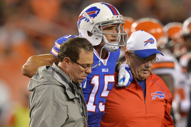 Buffalo Bills wide receiver Chris Hogan (15) is helped off the field after an injury during the first quarter of an NFL preseason football game against the Cleveland Browns, Thursday, Aug. 20, 2015, in Cleveland. (AP Photo/David Richard)