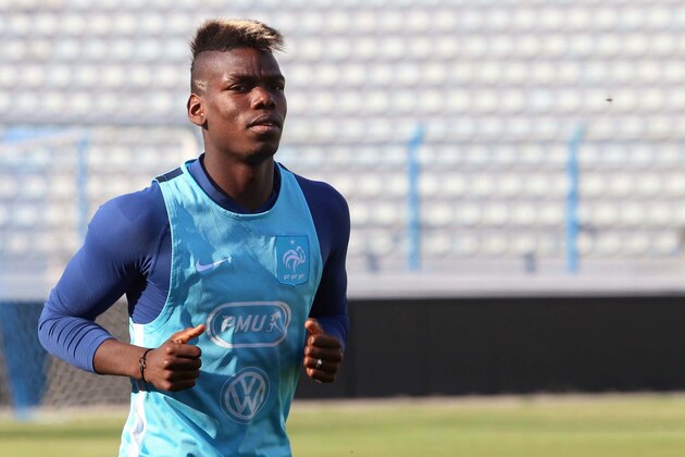 France's Paul Pogba attends a training session in Tirana, Friday June 12, 2015, one day ahead of the friendly match against Albania on Saturday. (AP Photo/Hektor Pustina)