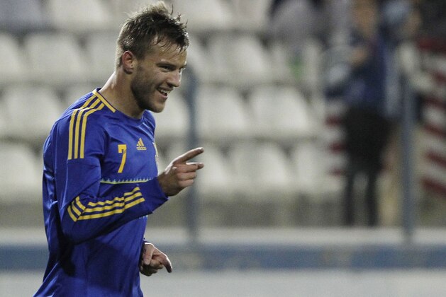 Andriy Yarmolenko of Ukraine celebrates his goal against U.S. during an international friendly match at Antonis Papadopoulos stadium in southern city of Larnaca, Cyprus, Wednesday, March 5, 2014. The Ukrainians are facing the United States in a friendly in Cyprus, a match moved from Kharkiv, Ukraine, to Larnaca for security reasons. (AP Photo/Petros Karadjias)