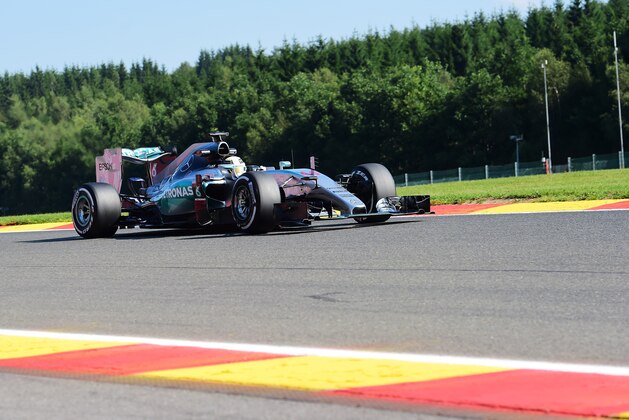 Mercedes AMG Petronas F1 Team's British driver Lewis Hamilton drives during the first practice session at the Spa-Francorchamps ciruit in Spa on August 21, 2015, ahead of the Belgian Formula One Grand Prix. AFP PHOTO / EMMANUEL DUNAND        (Photo credit should read EMMANUEL DUNAND/AFP/Getty Images)