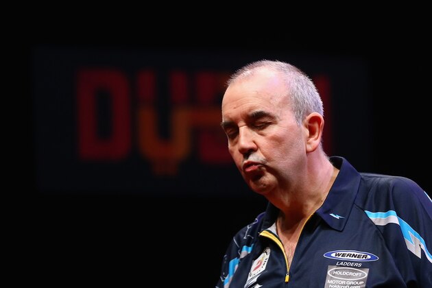 DUBAI, UNITED ARAB EMIRATES - MAY 29:  Phil Taylor of England reacts during the 2015 Dubai Duty Free Darts Masters at Dubai Duty Free Tennis Stadium on May 29, 2015 in Dubai, United Arab Emirates.  (Photo by Francois Nel/Getty Images)