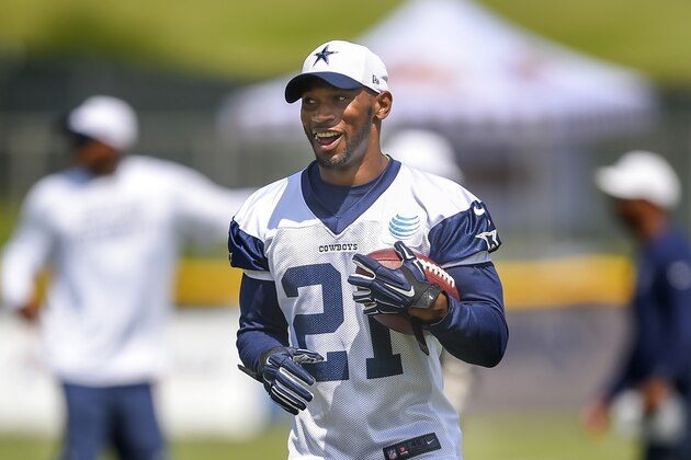 Dallas Cowboys running back Joseph Randle reacts after running an play during NFL football training camp, Friday, July 31, 2015, in Oxnard, Calif. (AP Photo/Gus Ruelas)