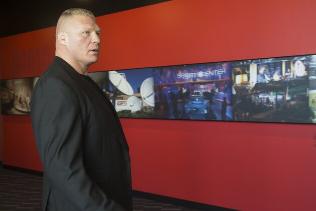 Former UFC heavyweight champion Brock Lesnar pauses for a photo after ruling out a return to mixed martial arts, ending three years of speculation about the biggest pay-per-view star in the sport's history, as he announced he had re-signed with WWE in an interview on ESPN's