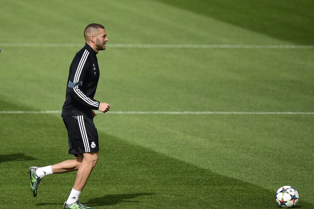 Real Madrid's French forward Karim Benzema trains at Valdebebas Sport City in Madrid on April 13, 2015 on the eve of their UEFA Champions League quarter final first leg football match against Atletico de Madrid. AFP PHOTO/ PIERRE-PHILIPPE MARCOU        (Photo credit should read PIERRE-PHILIPPE MARCOU/AFP/Getty Images)
