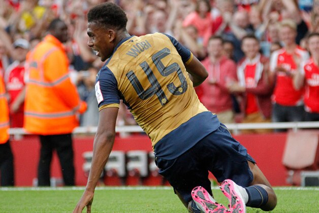 LONDON, ENGLAND - JULY 25: Alex Iwobi of Arsenal celebrates scoring a goal during the Emirates cup match between Arsenal v Olympique Lyonnais at The Emirates Stadium on July 25, 2015 in London, United Kingdom. (Photo by Mitchell Gunn/Getty Images)