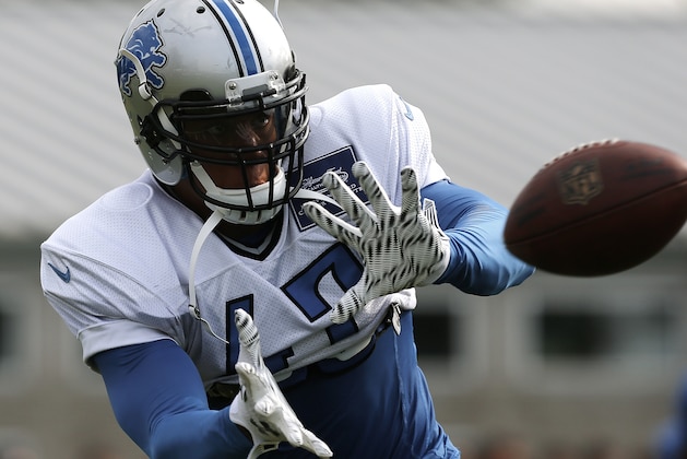 Detroit Lions safety Taylor Mays catches a ball during NFL football training camp in Allen Park, Mich., Friday, Aug. 7, 2015.  (AP Photo/Paul Sancya)