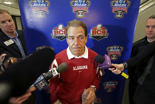 Alabama head coach Nick Saban speaks to reporters after practice for an upcoming NCAA college football game against Oklahoma in New Orleans, Saturday, Dec. 28, 2013. Alabama plays Oklahoma in the Sugar Bowl Jan. 2, 2014. (AP Photo/Gerald Herbert)